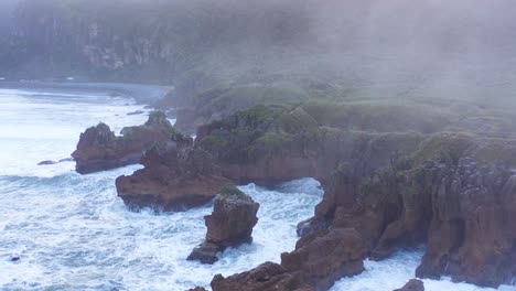 Aerial-Around-The-Pancake-Rocks-Geological-Formations-On-The-Coast-Of-South-Island-Of-New-Zealand-1
