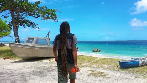 A-Native-Pacific-Islander-Walks-Towards-The-Beach-In-Slow-Motion-On-The-Island-Of-Vanuatu-Pacific-Islands-Melanesia