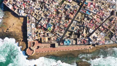 Nice-Colorful-Top-Down-Aerial-Over-The-Ancient-City-Of-Essaouira-Morocco-With-Ramparts-And-Medina-1
