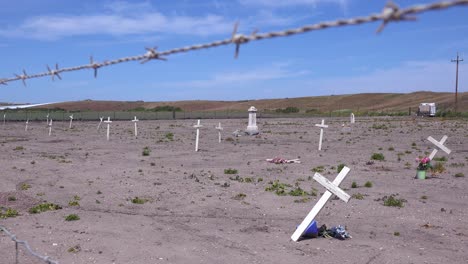 The-Graves-Of-Unknown-Mexican-Immigrant-Hispanic-Farm-Workers-Are-Marked-By-Crosses-In-A-Graveyard-Cemetery-Near-Guadeloupe-4