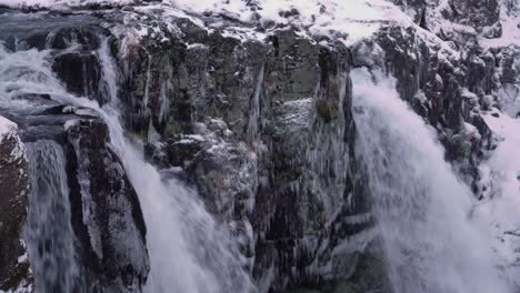 Waterfalls-are-seen-in-closeup-on-Kirkjufell-Mountain-on-the-Snaefellsne-Peninsula-of-Iceland