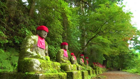 The-NarabiJizo-statues-are-seen-in-a-forested-area-of-Nikko-Japan-2