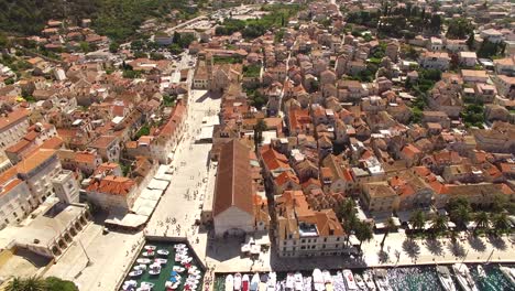 An-Aerial-View-Shows-Boats-Docked-In-The-Port-Town-Of-Hvar-Croatia