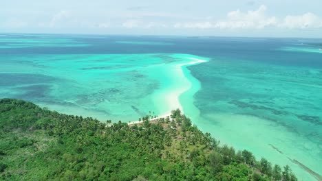 An-Aerial-View-Shows-Palm-Trees-And-The-Serpentine-Sandbank-Of-Snake-Island-Indonesia