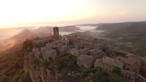 An-Aerial-View-Shows-Civita-Di-Bagnoregio-Italy-At-Sunset-2