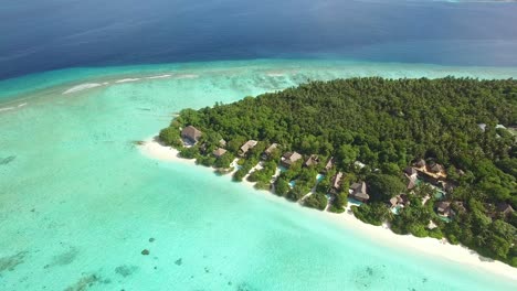 An-Aerial-View-Shows-An-Island-Resort-On-Maldives