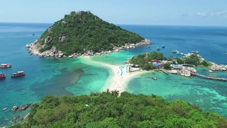 An-Aerial-View-Shows-Boats-Anchored-Near-And-Tourists-Relaxing-On-The-Interconnected-Ko-Tao-Islands-In-Thailand-2