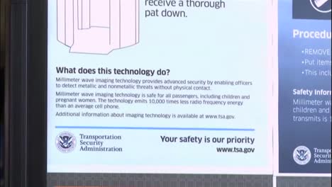 Airport-Travelers-Go-Through-A-Tsa-Security-Checkpoint-4
