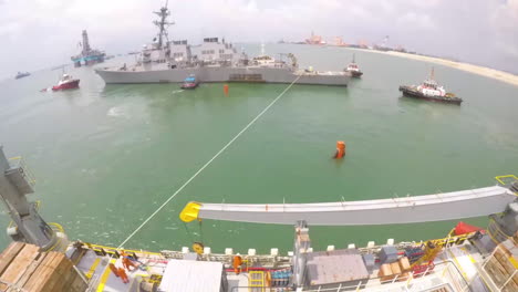 Timelapse-Film-Shows-The-Uss-John-S-Mccain-Getting-Loaded-On-The-Heavy-Lift-Transport-Mesa-Verde-Treasure-In-Singapore