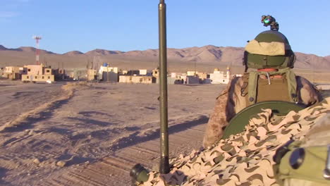 Us-Soldiers-And-Marines-Take-Part-In-A-Field-Training-Exercise-At-Fort-Irwin-In-An-Environment-Made-Up-To-Look-Like-The-Middle-East