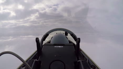 A-Squadron-Of-T38C-Planes-Flies-Through-The-Clouds-With-The-Footage-Shot-From-One-Of-The-Aircrafts-Cockpits