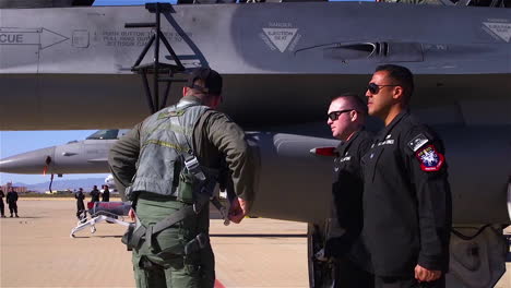 An-F16-Viper-Pilot-For-The-Us-Air-Force-Boards-His-Aircraft-At-An-Air-Force-Base