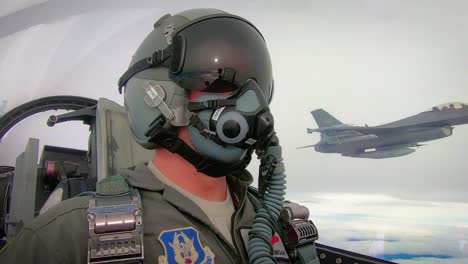 Cockpit-View-Of-A-Pilot-As-He-Makes-Visual-Communication-With-Another-Pilot-Mid-Flight-Red-Flag-191-Exercise-Nellis-Air-Force-Base-2019