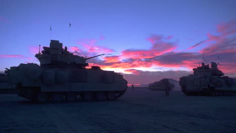 A-Company-Of-American-Military-Tanks-Out-In-the-Desert-At-Sunset-2019