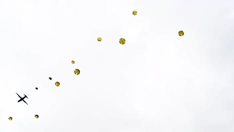 Paratroopers-As-they-Jump-Out-Of-A-World-War-Ii-Era-Plane-One-By-One-Near-Saintemereeglise-France-For-the-75th-Commemoration-Of-Dday-June-9th-2019