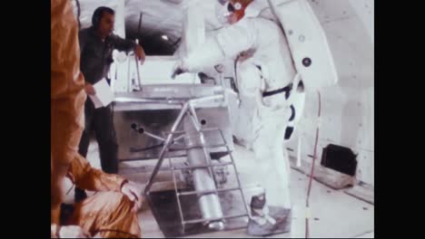 Astronauts-Neil-Armstrong-Buzz-Aldrin-And-Fred-Haise-Practice-Walking-Up-A-Ladder-While-In-Training-In-A-Zero-Gravity-Simulation-1969