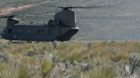 American-Troops-Disembark-From-A-Transport-Helicopter-In-A-Dry-Field