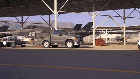 Airman-With-the-388th-Fighter-Wing-Load-Munitions-Onto-F35S-During-Weapons-Evaluation-Exercise-At-Hill-Air-Force-Base-Ut