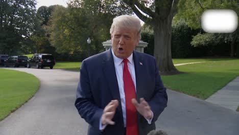 Us-President-Trump-Addresses-Reporters-On-the-White-House-Lawn-the-Day-After-the-1St-Presidental-Debate-4