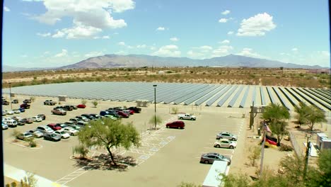 Tilt-Down-To-A-Large-And-Impressive-Solar-Panel-Array-Powering-A-Business