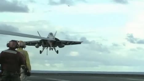 Jets-Land-And-Take-Off-From-The-Deck-Of-An-Aircraft-Carrier