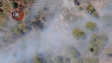 Pov-From-A-Water-Dropping-Helicopter-Of-The-Bucket-1