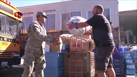 National-Guard-Army-Troops-Distribute-Food-And-Relief-Aid-To-People-After-A-Devastating-Forest-Fire-1