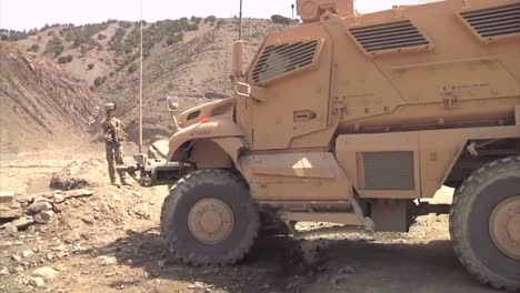 American-Soldiers-Man-A-Checkpoint-In-A-Remote-Mountain-Outpost-Of-Afghanistan