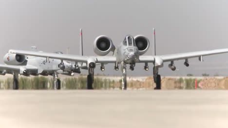 Fighter-Jets-Are-Outfitted-With-Bombs-At-Bagram-Afb-During-The-War-In-Afghanistan