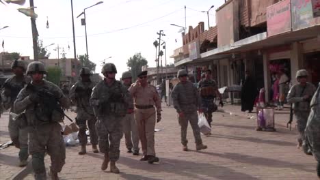 Us-Troops-And-Iraqi-Officials-Walk-Through-The-Town-Of-Samarra-Iraq