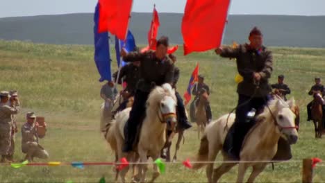 Mongolian-Horsemen-Ride-In-A-Ceremonial-Event