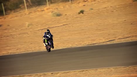 A-Superbike-Rider-Performs-Stunts-On-The-Track-And-On-The-Highway