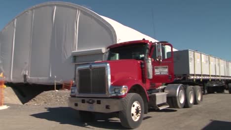 Radioactive-Nuclear-Waste-Is-Transported-From-The-Decommissioned-Hanford-Nuclear-Facility-By-Truck-1