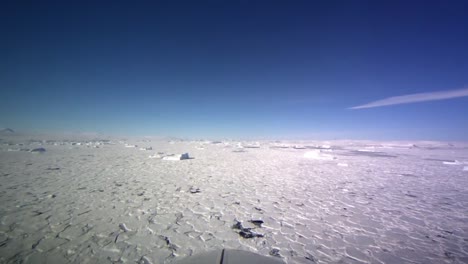 Pov-Shot-From-The-Front-Of-A-Plane-Flying-Over-Frozen-Arctic-Tundra-4