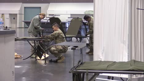 National-Guardsmen-Ready-The-Santa-Clara-Convention-Center-In-California-As-An-Emergency-Hospital-During-The-Coronavirus-Covid19-Outbreak-Epidemic