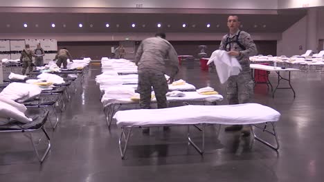 National-Guardsmen-Set-Up-Beds-And-Cots-At-The-Santa-Clara-Convention-Center-In-California-An-Emergency-Hospital-During-The-Coronavirus-Covid19-Outbreak-Epidemic-1