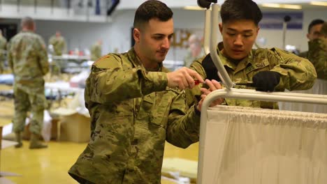 National-Guard-Troops-Set-Up-Emergency-Hospital-At-Connecticut-State-University-During-The-Coronavirus-Covid19-Epidemic-Emergency