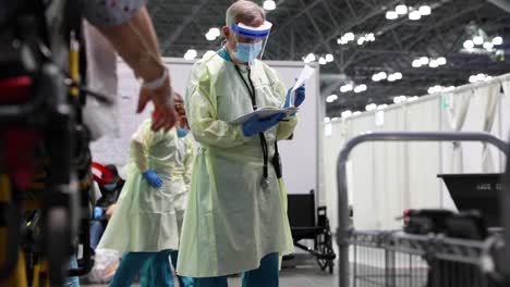 New-York-Coronavirus-Covid19-Intensive-Care-Doctors-And-Nurses-Treat-Elderly-At-The-Javits-Convention-Center-During-The-Pandemic-Epidemic-Outbreak
