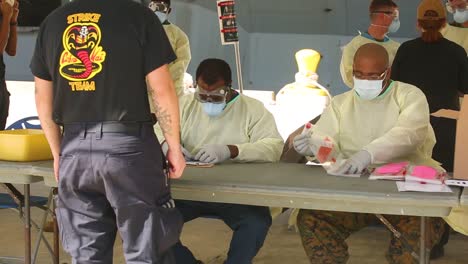 Sailors-On-The-Uss-Navy-Theodore-Roosevelt-Are-Tested-For-The-Coronavirus-Covid19-In-Guam-During-The-Peidemic-Outbreak-Onboard-The-Ship