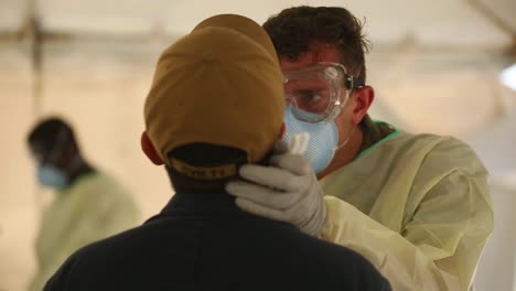 Sailors-On-The-Uss-Navy-Theodore-Roosevelt-Are-Tested-For-The-Coronavirus-Covid19-In-Guam-During-The-Peidemic-Outbreak-Onboard-The-Ship-1