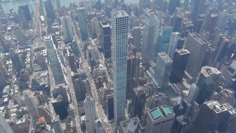 Amazing-aerial-over-432-Park-Ave-residential-skyscraper-and-Manhattan-New-York-City