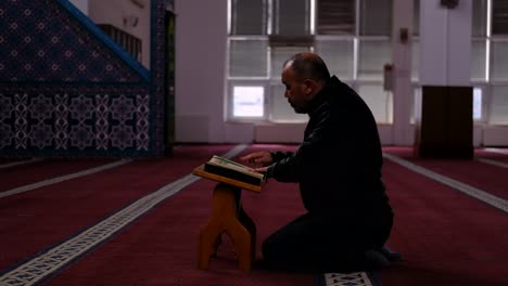 Middle-Age-Man-Read-Quran-Mosque-1