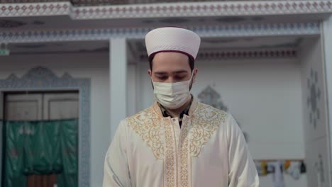 Masked-Muslim-Imam-Praying-In-Mosque