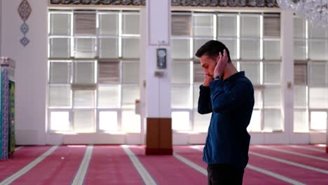 Young-Man-Prays-and-Worships-In-Mosque