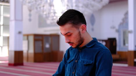Young-Man-Prays-in-Sunny-Mosque