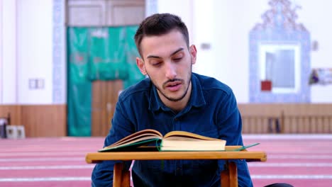 Man-Reads-The-Quran-In-Mosque