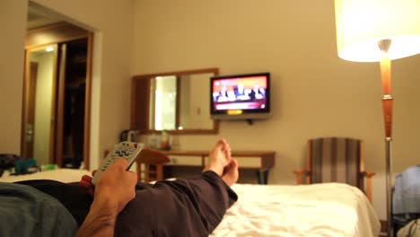 Young-Man-Watching-Tv-In-Hotels-Room-1