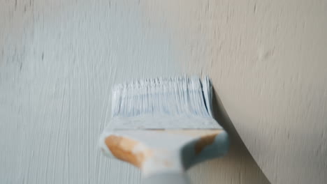 Builder-Paints-Wall-Brush-View