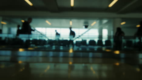 Silhouettes-of-passengers-in-the-airport-lounge-5