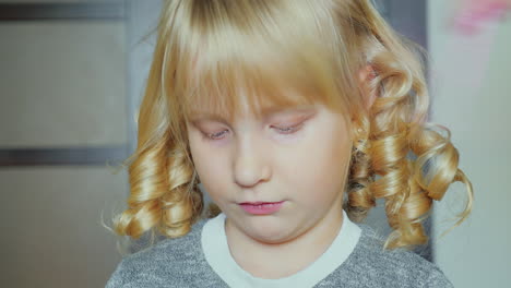 Portrait-Of-5-Years-Old-Girl-Doing-Makeup-2